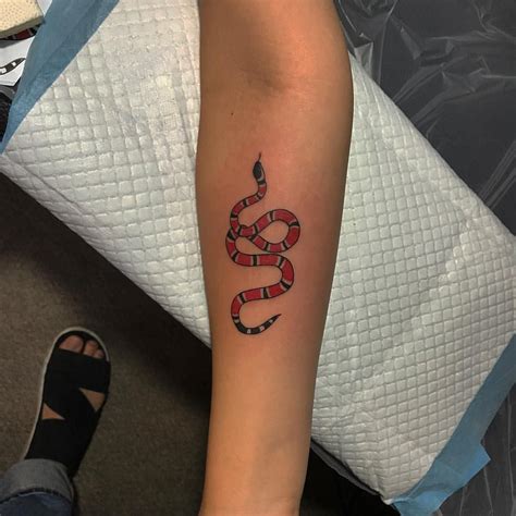 gucci snake tattoo on finger